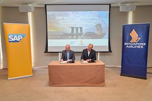 Scott-Russell-President-SAP-Asia-Pacific-Japan-left-and-Campbell-Wilson-Senior-Vice-President-of-Sales-and-Marketing-Singapore-Airlines-signing-the-MOU.jpg